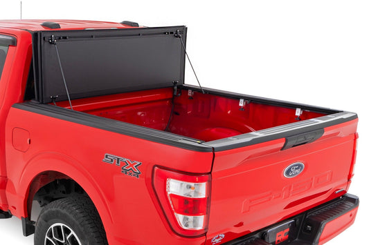 Rough Country 49220550 Hard Tri-Fold Flip Up Bed Cover | 5'7" Bed | Ford F-150 2WD/4WD (2015-2020)