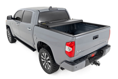 Rough Country 49414551 Hard Tri-Fold Flip Up Bed Cover | 5'7" Bed | Toyota Tundra 2WD/4WD (07-21)