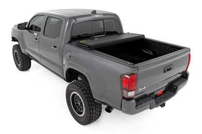 Rough Country 49420500 Hard Tri-Fold Flip Up Bed Cover | 5' Bed | Toyota Tacoma 2WD/4WD (2016-2023)