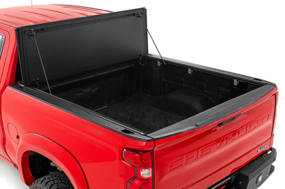 Rough Country 49120580 Hard Tri-Fold Flip Up Bed Cover | 5'10" Bed | Chevy/GMC Sierra 1500 (19-26)/Silverado 1500 (19-26)