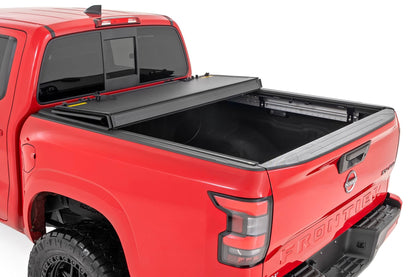 Rough Country 49520551A Hard Tri-Fold Flip Up Bed Cover | 5' Bed | Nissan Frontier 2WD/4WD (22-26)