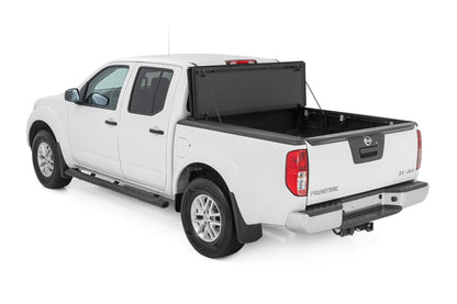 Rough Country 49520501 Hard Tri-Fold Flip Up Bed Cover | 5' Bed | Nissan Frontier 2WD/4WD (05-21)