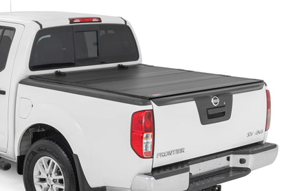 Rough Country 49520501 Hard Tri-Fold Flip Up Bed Cover | 5' Bed | Nissan Frontier 2WD/4WD (05-21)