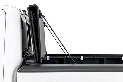 Rough Country 49520501 Hard Tri-Fold Flip Up Bed Cover | 5' Bed | Nissan Frontier 2WD/4WD (05-21)