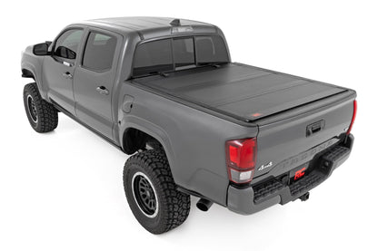 Rough Country 49420500 Hard Tri-Fold Flip Up Bed Cover | 5' Bed | Toyota Tacoma 2WD/4WD (2016-2023)