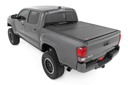 Rough Country 49415600 Hard Tri-Fold Flip Up Bed Cover | 6' Bed | Toyota Tacoma 2WD/4WD (2005-2015)