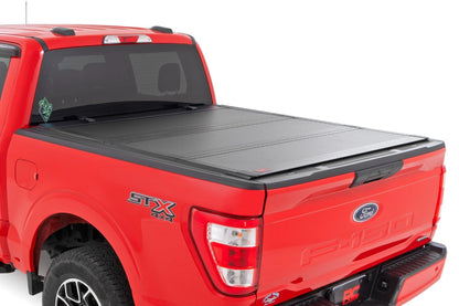 Rough Country 49220550 Hard Tri-Fold Flip Up Bed Cover | 5'7" Bed | Ford F-150 2WD/4WD (2015-2020)