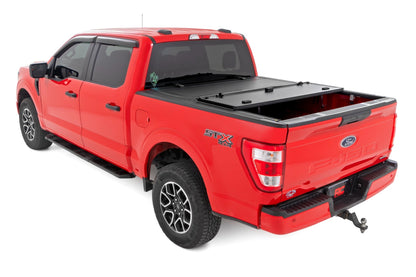Rough Country 49220550 Hard Tri-Fold Flip Up Bed Cover | 5'7" Bed | Ford F-150 2WD/4WD (2015-2020)
