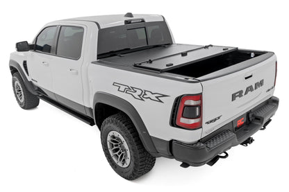 Rough Country 49320550 Hard Tri-Fold Flip Up Fold Bed Cover | 5'7" Bed | Ram 1500 (19-26)/1500 TRX (21-24)