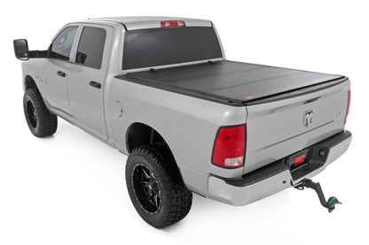 Rough Country 49319550 Hard Tri-Fold Flip Up Bed Cover | 5'7" Bed | Ram 1500 2WD/4WD (2009-2018 & Classic)