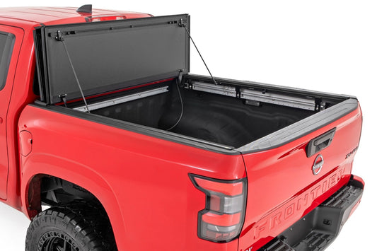 Rough Country 49520551A Hard Tri-Fold Flip Up Bed Cover | 5' Bed | Nissan Frontier 2WD/4WD (22-26)