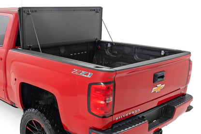 Rough Country 49119651 Hard Tri-Fold Flip Up Bed Cover | 6'7" Bed | Rail Cap | Chevy/GMC 1500/2500HD/3500HD (14-19)