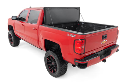 Rough Country 49119651 Hard Tri-Fold Flip Up Bed Cover | 6'7" Bed | Rail Cap | Chevy/GMC 1500/2500HD/3500HD (14-19)