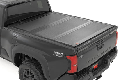 Rough Country 49420650 Hard Tri-Fold Flip Up Bed Cover | 6' Bed | Toyota Tacoma 2WD/4WD (2024-2026)