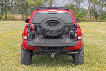 Rough Country 73110 Bed Mount Spare Tire Carrier | Universal (5x5.5 6x5.5 6x135 & 5x5.0 Bolt Patterns)