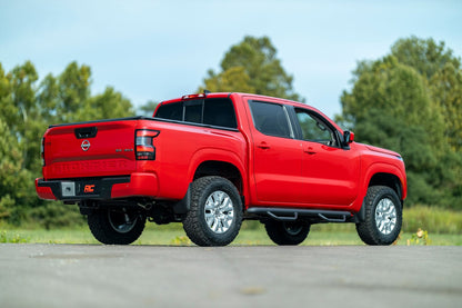 Rough Country 867RED 2.5 Inch Leveling Kit | Red Spacers | Nissan Frontier (05-25)/Xterra (05-15)