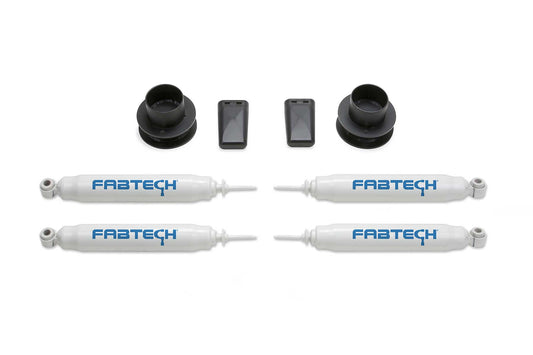 Fabtech 2.5 in. COIL SPCR KIT W/PERF SHKS 2014-18 RAM 2500 4WD