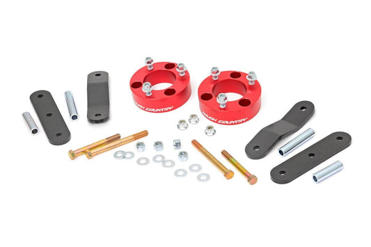 Rough Country 867RED 2.5 Inch Leveling Kit | Red Spacers | Nissan Frontier (05-25)/Xterra (05-15)